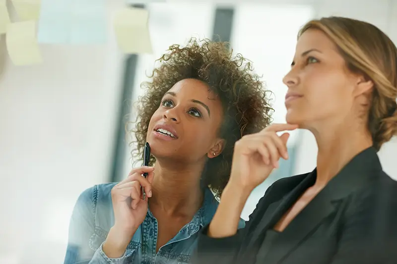 thoughtful-women-collaborating
